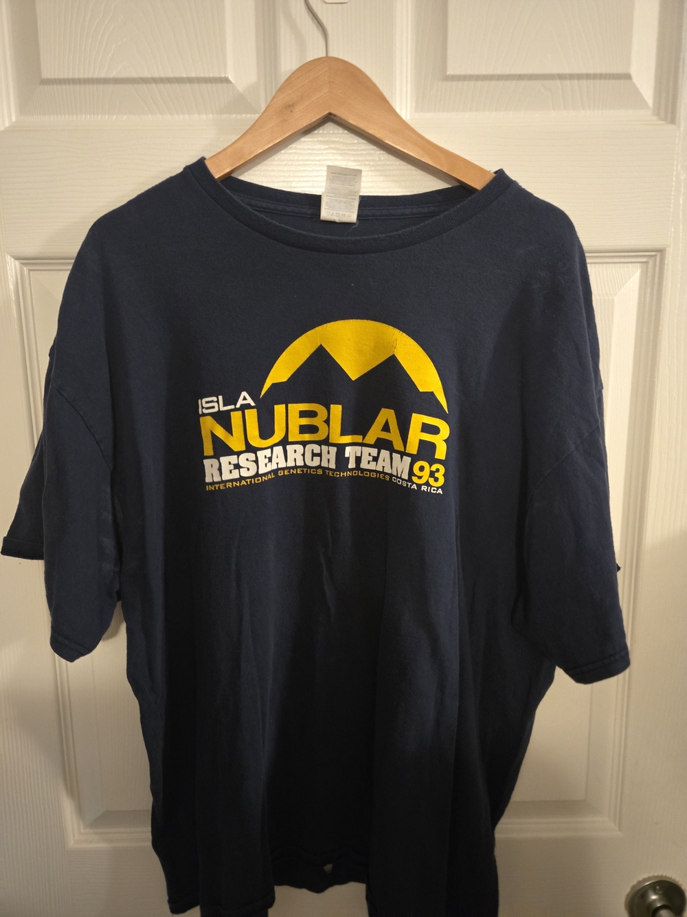 Delta Navy Graphic 'Isla Nublar Research Team' Short Sleeve Tee